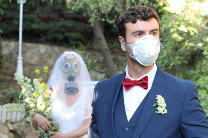 wedding couple in hazard, source: Shutterstock