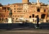 man on electric scooter between roman monuments, source: Shutterstock