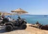 Motorcycles parked near Red Beach, Santorini, source: vivooo / Shutterstock.com
