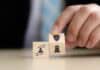 Work insurance and safety dice concept, source: Shutterstock