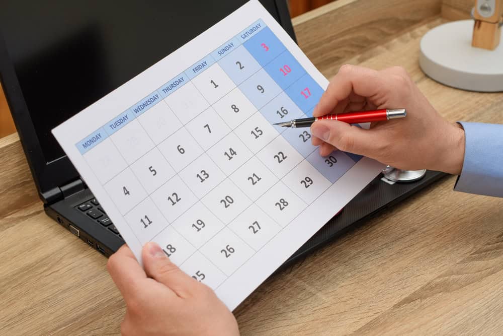 Calendar checking, source: Shutterstock