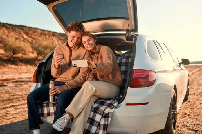 young couple in car, source: Shutterstock