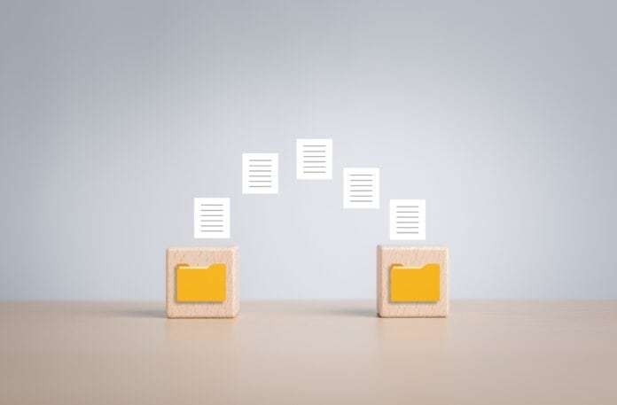 files transfer to folder, source: Shutterstock