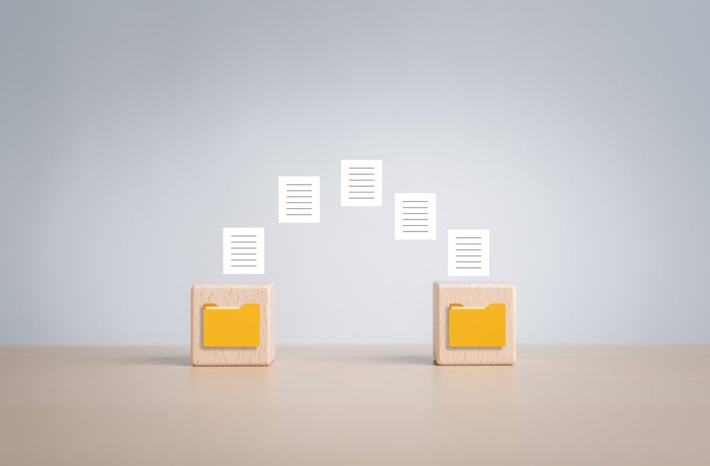 files transfer to folder, source: Shutterstock