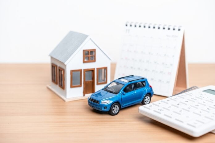 car and property insurance concept, source: Shutterstock