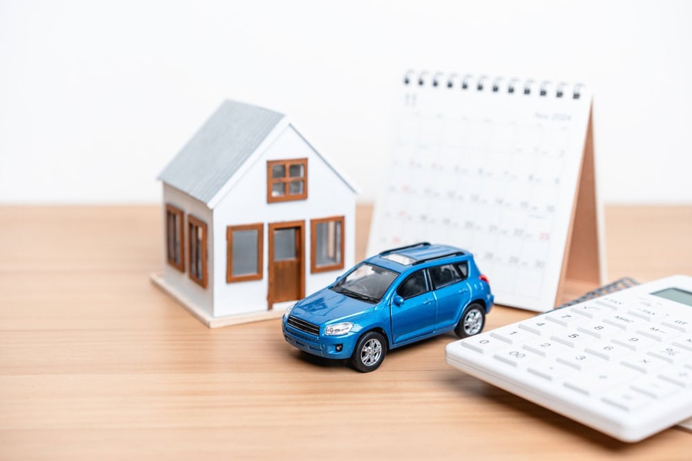 car and property insurance concept, source: Shutterstock