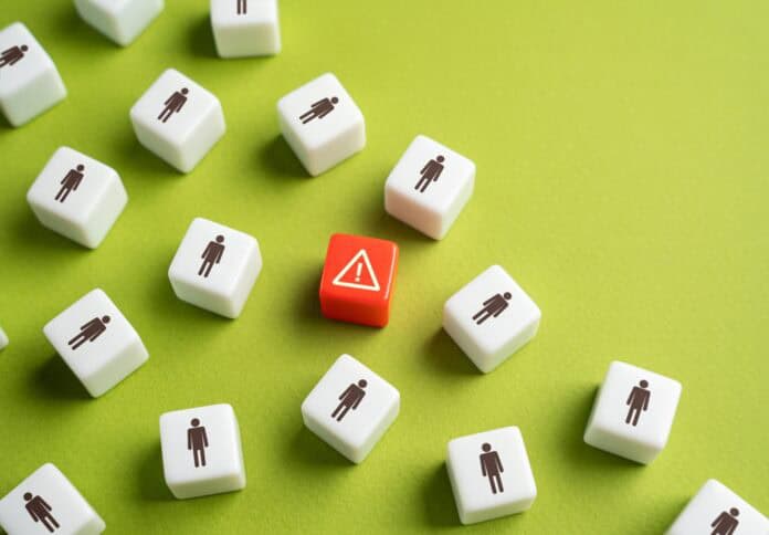 Sign,Of,Threat,Among,People.,Crime,And,Marginal,Elements.,Terrorist Danger among people concept, source: Shutterstock