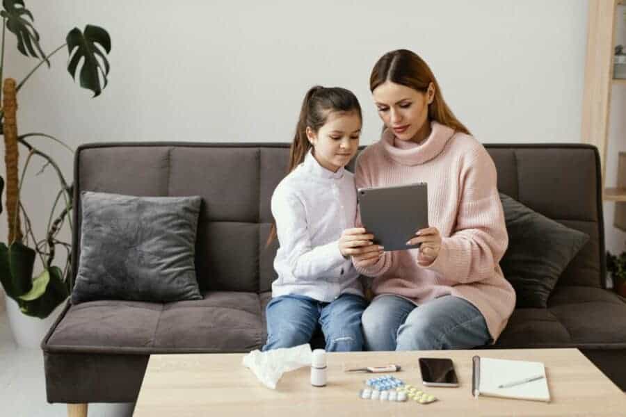 Mother and daughter with tablet