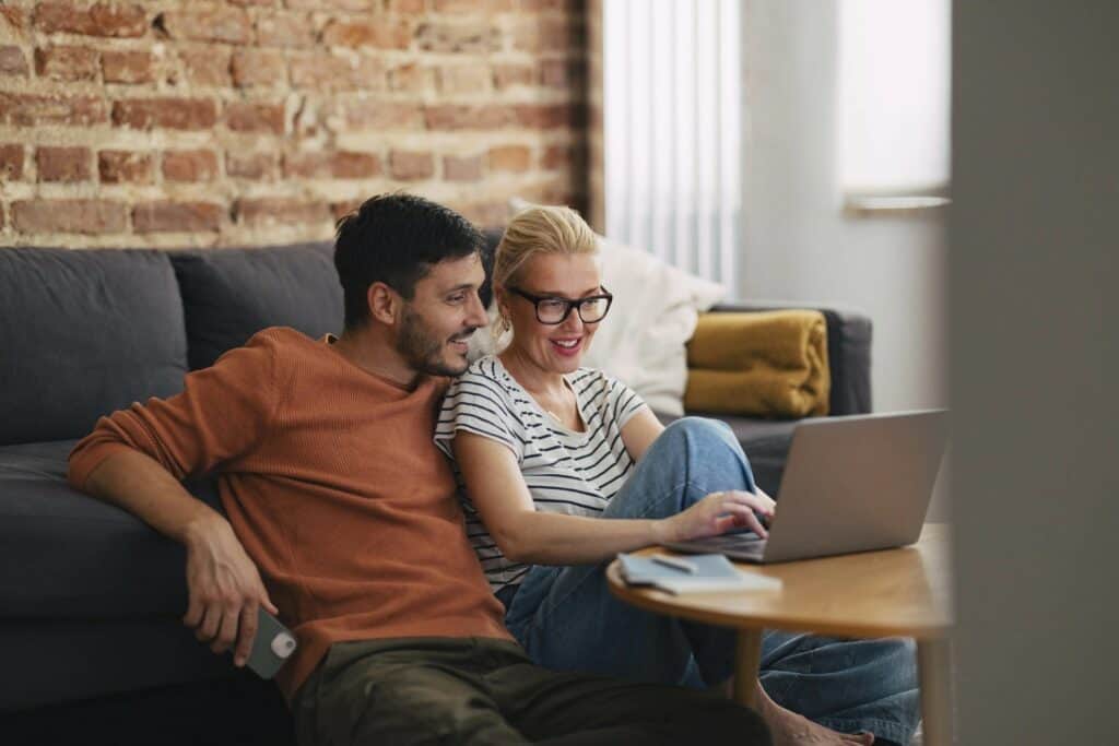 Couple at laptop, Eurolife promo