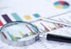 magnifying glass on statistics, source: Shutterstock