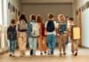 Children with schoolbags at school, source: Shutterstock