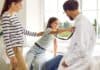 Girl patient playing with pediatrician, source: Shutterstock