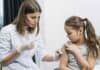 Child vaccinated by pediatrician