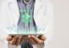 Doctor with tablet, health data concept