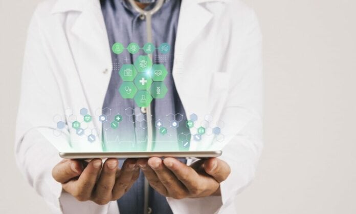 Doctor with tablet, health data concept