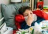 Sick child in bed