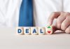 Deal and no deal concept with dice, source: Shutterstock