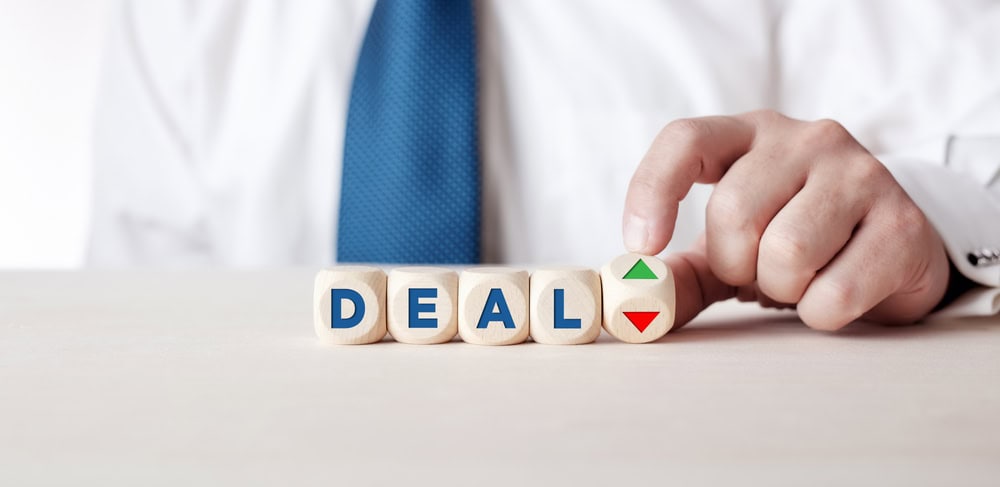Deal and no deal concept with dice, source: Shutterstock