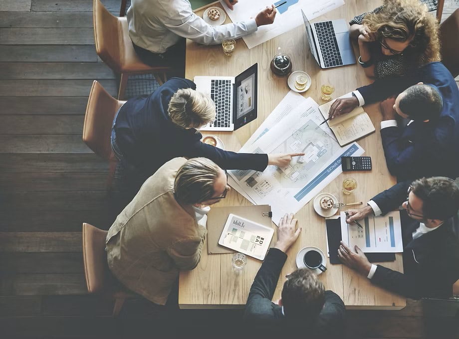 Business meeting, statistics concept, source: Rass / Shutterstock