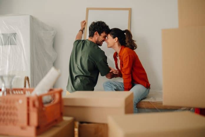 Young couple moving in new home, source: Shutterstock