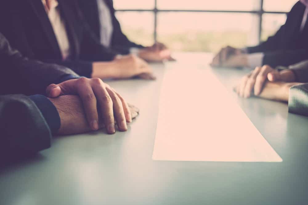Meeting negotiations concept, source: Shutterstock