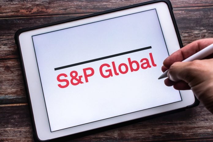 Logo of S and P Global Inc. on tablet, source: Shutterstock