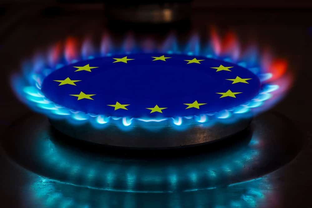 Europe flag and hob burner of blue gas, energy crisis concept, source: Shutterstock
