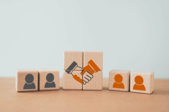 Collective agreemnt concept with wooden blocks, source: Shutterstock