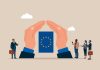 European insurance and HR, illustration with hands around EU flag and employees, source: Shutterstock