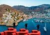 Hydra island and insurers on questionmarks, composition with images from Shutterstock