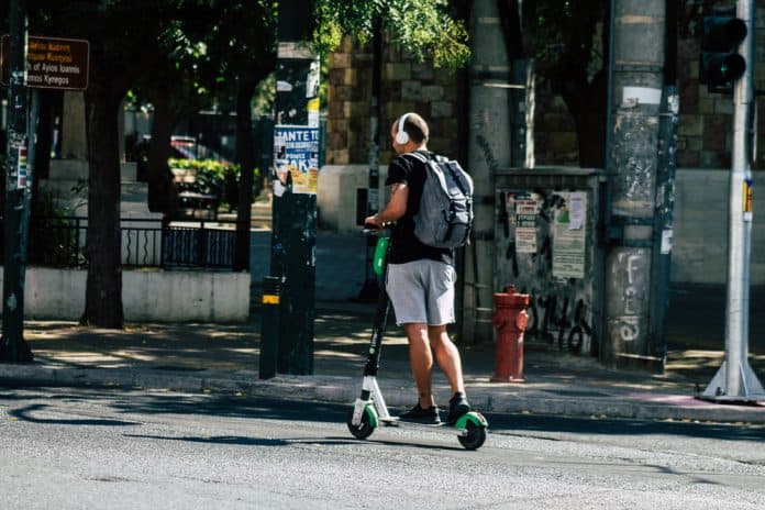 Athens,Greece,September,4,,2019,View,Of,Unknown,People,Driving Man on electric scooter, Athens, source: Shutterstock