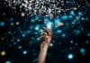 Human and technology concept with hand and cloud of lights, source: Shutterstock