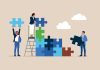 People building puzzle illustration, teambuidling and occupational insurance concept, source: Shutterstock