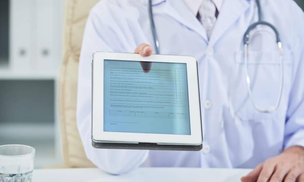 Digital health, doctor giving tablet