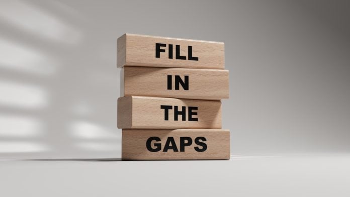 Wooden block with fill in the gaps message, source: Shuterstock
