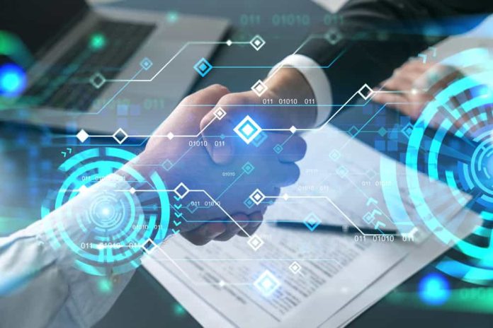 Double,Exposure,Of,Two,Businesspeople,Handshake,And,Binary,Technology,Hologram