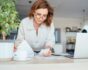 Owner of small business checking documents, source: Shutterstock