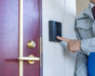 Salesman ringing doorbell, source: Shutterstock