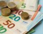 Euro banknotes and coins, source: Shutterstock