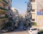 Greek cars, view down a typical steep car lined residential street in Athens Greece, source: Shutterstock