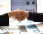 Handshake and statistics, deal concept, source: Shutterstock