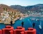 Hydra island and insurers on questionmarks, composition with images from Shutterstock